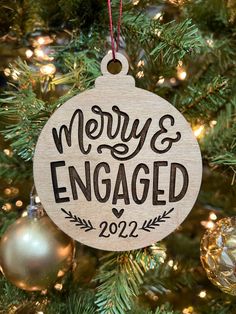 merry and married ornament hanging on a christmas tree