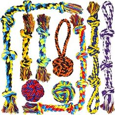 an assortment of colorful ropes and knots on a white background