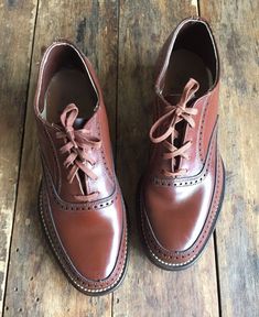 "Vintage boys Star Value Jr brown lace oxfords. Excellent condition with barely a sign of wear. Original box included, but it does show a lot fo wear. These date to circa 1940s. The insole is 8-1/8\" long and according to size charts, converts to a youth size 2, approximately in the 7 to 8 year range. Measurements: bottom of sole 9-1/4\" long 3-1/2\" across ball of foot insole 8-1/8\" long" Vintage Brown Lace-up Shoes With Rubber Sole, Vintage Brown Lace-up Business Shoes, Retro Wingtip Lace-up Shoes With Brogue Detailing, Retro Wingtip Brogue Lace-up Shoes, Retro Oxford Lace-up Shoes With Brogue Detailing, Vintage Low-top Lace-up Shoes With Rubber Sole, Vintage Low-top Lace-up Shoes With Leather Sole, Retro Oxfords With Brogue Detailing And Round Toe, Retro Brogue Oxfords With Round Toe