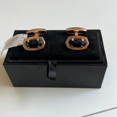 These Cuff Links In Gold And Onyx Are The Finishing Touch Every Suit Needs. Our Signature Kendra Scott Shape Pairs With Sleek, High-Polished Metals To Create An Elevated Accessory That’s Ready To Take Your Formal Looks To The Next Level. New With Tags. Never Worn In The Signature Velvet Box. Would Be A Great Gift. Stone Is 6/8" In Width Adjustable Black Cufflinks For Business, Elegant Black Cufflinks For Business, Black Cuff Jewelry For Business, Classic Black Business Cufflinks, Black Luxury Cufflinks For Formal Occasions, Black Luxury Cufflinks For Formal Wear, Luxury Black Cufflinks For Formal Occasions, Elegant Black Cufflinks For Gift, Luxury Black Formal Cufflinks