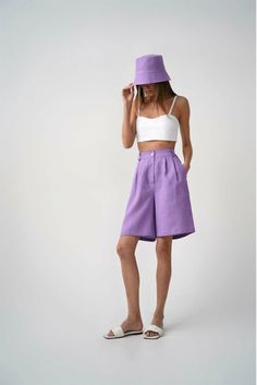 Elevate your summer wardrobe with these elegant and comfortable high-waisted linen Bermuda shorts designed exclusively for women. Crafted with meticulous attention to detail, these long shorts offer both style and functionality, making them a must-have addition to your seasonal attire. Key Features: - High-Waisted Elegance: The high-waisted design not only flatters your figure but also provides a secure and comfortable fit. Whether you're strolling along the beach or exploring the city, these shorts offer both style and support. - Premium Linen Fabric: Our Bermuda shorts are made from high-quality linen fabric, which is renowned for its breathability and moisture-wicking properties. This ensures that you stay cool and comfortable even in the hottest of summer days. - Long Length: These sho Longer Shorts Outfits Women, Long Shorts Outfits Women, High Waisted Linen Pants, Bermuda Pants, Bermuda Shorts Women, Shorts Outfits Women, Chic Blouses, Designer Shorts, Long Shorts