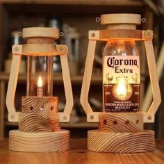 two wooden lamps made out of beer bottles