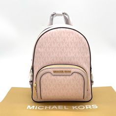 Brand New With Tag Michael Kors Jaycee Xs Mini Convertible Zip Pocket Backpack Crossbody Pvc Leather Mk Signature Color: Light Powder Blush Gold Tone Hardware Michael Kors Logo On Front 1 Zip Pocket At Front Zip Top Closure Custom Fabric Lining 2 Slip-In Pockets 7" (L) X 9' (H) X 3' (D) 2" Top Handle & Adjustable Backpack Straps Pink Backpack For Errands, Blush Travel Bag With Dust Bag Included, Luxury Pink Backpack For Everyday Use, Pink Leather Backpack For Errands, Designer Pink Backpack, Pink Michael Kors Backpack For Travel, Michael Kors Pink Travel Bag, Designer Pink Standard Backpack, Michael Kors Backpack With Detachable Strap