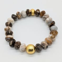 Made with a stunning combination of Wood Jasper and 24 karat Gold-plated Brass, this bracelet exudes elegance and sophistication. The organic patterns of the Wood Jasper add a touch of natural beauty, while the 24 karat Gold-plated Brass adds a luxurious touch. Ro & Gieo Wood Jasper and 24 karat Gold-plated Brass Bracelet Bead size - 10 - 11.5 mm Bracelet length - 7 inches If you want your bracelets in a different size than 7 inches, we are more than happy to accommodate your request. Please sim Organic Patterns, Bracelet Bead, Organic Pattern, Brass Bracelet, Soft Toothbrush, Special Jewelry, Beauty Favorites, Brass Jewelry, Brass Metal