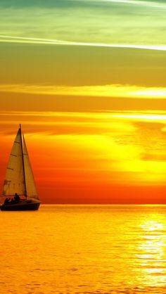 a sailboat in the ocean at sunset with an inspirational quote about life and work