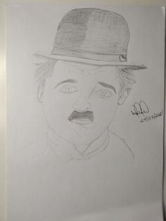 a drawing of a man with a hat on his head and mustache, in pencil