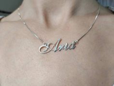 Silver Name Chain - Handwriting Necklace - Cursive Name Charm - English Letters Necklace - Aria . . . . . . . . . . . . . . . . . . . . . . . . . . . . . . . . . . . . . . . . . . . . . . . . . . . . . . . . . . . . . . . . . . . . . . . . . . . . . . . Looking for a thoughtful gift for your loved one? You will love this high quality Silver Name Chain. This is a perfect gift for your girlfriend or wife. Personalize it with her name in a beautiful font. This lovely sterling silver name chain is m Hallmarked White Gold Name Necklace For Anniversary, Silver Hallmarked Nameplate Jewelry, Fine Jewelry Silver Nameplate Necklace, Silver Nameplate Necklace In Fine Jewelry Style, Silver Name Necklace For Formal Occasions, Formal Silver Name Necklace Fine Jewelry, Formal Sterling Silver Name Necklace, Formal Silver Name Necklace In Fine Jewelry Style, Formal Sterling Silver Hallmarked Name Necklace