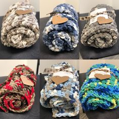 four different types of knitted blankets with tags attached to the handles and bottoms