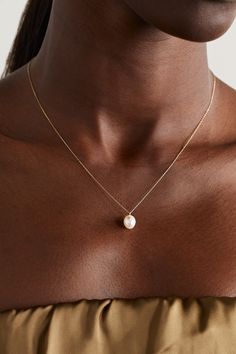 Understated and elegant, Mateo's necklace is the perfect accessory for so many outfits. It's handmade from 14-karat gold and strung with a single pearl that's illuminated by a tiny twinkling diamond. The delicate chain adjusts between three lengths, allowing you to find the ideal drop. Refined Pearl Chain Necklace As Gift, Elegant 14k Gold Pearl Drop Necklace, Refined Pearl Chain Necklace For Gift, Dainty White Gold Pearl Necklace For Formal Occasions, Pearl White Dainty Necklace For Formal Events, Refined Yellow Gold Pearl Necklace For Wedding, Formal Dainty White Gold Pearl Necklace, Classic Single Strand Pearl Necklace In 14k Gold, Classic 14k Gold Pearl Necklace