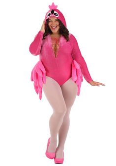 a woman in a pink costume posing for the camera