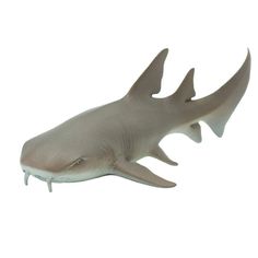 a toy shark with its mouth open on a white background