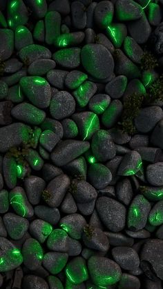 some rocks with green lights on them