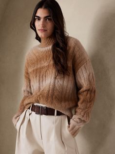 No two are alike.  Using a gorgeous blend of luxurious alpaca, the yarn from this decadent cable-knit sweater hails from an Italian mill that employs a long space-dye process to create soft ombré color unique to each sweater.  RELAXED FIT: Expertly Ombre Sweater, Ombre Yarn, Camel Sweaters, Blue Knit Sweater, Banana Republic Sweater, Banana Republic Women, Ombre Color, Merino Wool Sweater, Chunky Sweater