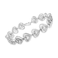 Love will be on your mind when you wear this sterling silver heart link bracelet. A polished sterling silver open heart holds inside a smaller one inlaid with glistening round cut diamonds. 15 heart links make up this 1/4ct TDW diamond bracelet that secures with a lobster claw clasp. Double Heart, Bracelet Collection, Open Heart, Small Heart, Sterling Silver Heart, Heart Jewelry, Round Cut Diamond, High Quality Jewelry, Diamond Gemstone