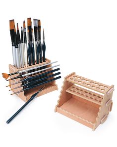 PRICES MAY VARY. 【Multifunctional Brush Station】Package includes 2 Packs of wood brush holder that fit a variety of size brushes in different directions. Paintbrush organizer helps you to stand brushes vertically for long storage, lay them down horizontally for drying, and rest at the bottom groove to stop brushes from rolling away while painting. 【Enough Holes to Store】The 2 paint brush holders and organizers have total 32 vertical holes(Qty 16 0.43” & Qty 16 0.39”), 12 horizontal paint brush d Pen Stand Painting Ideas, Paintbrush Organizer, Paint Brush Holder, Art Supplies Gift, Paint Organization, Painting Station, Brush Rest, Paint Brush Holders, Brush Holders