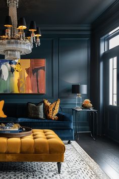 a living room filled with furniture and a chandelier