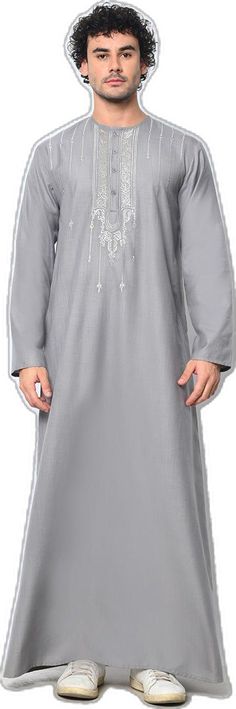 Ornate Reverence: Islamic Embroidered Men's Grey Thobe with Pockets - EastEssence.com Elegant Kurta With Traditional Fit For Ceremonies, Elegant Traditional Fit Kurta For Ceremonies, Gray Traditional Wear For Eid, Traditional Gray Wear For Eid, Gray Embroidered Kurta For Eid, Embroidered Gray Kurta For Eid, Gray Traditional Wear For Festive Occasions, Classic Long Sleeve Traditional Wear For Eid, Festive Gray Embroidered Kurta