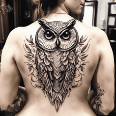 a woman with an owl tattoo on her back