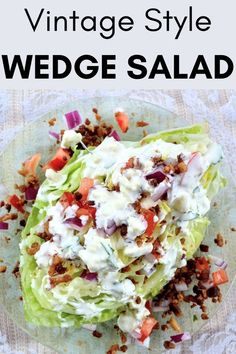 a plate with lettuce, carrots and dressing on it that says vintage style wedge salad