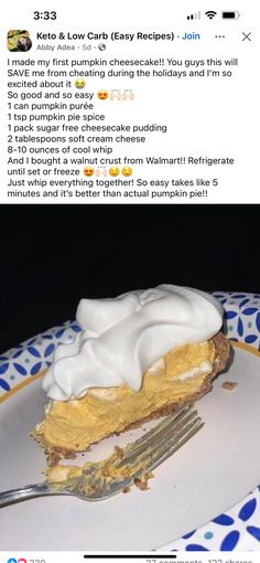 a white plate topped with a piece of pie covered in frosting next to a fork