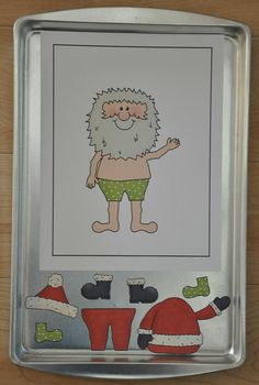 a metal tray with an image of a santa clause on it