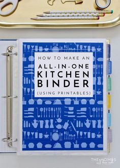 an all - in - one kitchen binder is shown with scissors and other items