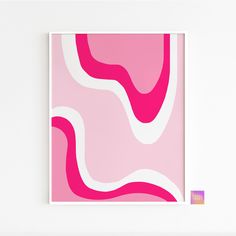 a pink and white abstract painting on a wall