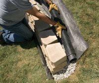 a man laying on the ground with a blow dryer attached to it's side