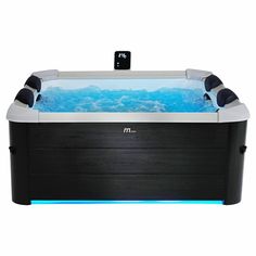 an inflatable hot tub is shown with blue water and black trimmings