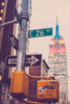 street signs and traffic lights in the city