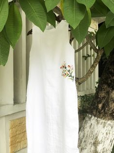 White Linen Dress With Hand Embroidered Wild Flower Pattern - Etsy White Embroidered Dress For Garden Party, White Linen Dress For Summer Garden Party, White Floral Embroidered Dress For Summer, White Cotton Embroidered Dress For Garden Party, Summer Linen Dress With Floral Embroidery For Garden Party, White Embroidered Summer Dress, Summer Embroidered Linen Dress For Garden Party, Summer Linen Embroidered Dress For Garden Party, White Linen Sundress