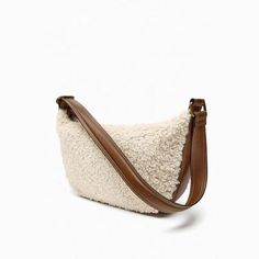 SPECIFICATIONSBrand Name: NoEnName_NullHandbags Type: Shoulder BagsTypes of bags: Shoulder & HandbagsMain Material: Faux FurLining Material: POLYESTERShape: FLAPPlace Of Origin: GUANG DONG ProvincePlace Of Origin: GUANG DONG ProvinceOrigin: Mainland ChinaCN: GuangdongHardness: SOFTPattern Type: SolidInterior: Interior Zipper PocketDecoration: noneExterior: noneOccasion: VersatileClosure Type: zipperGender: WOMENStyle: fashionNumber of Handles/Straps: Single