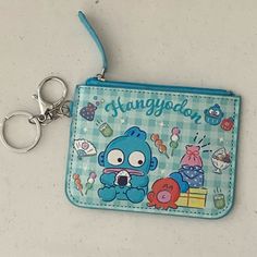 New. Pu Leather. Blue Bag With Interior Key Chain Holder For Gift, Cute Blue Wallet With Card Slots, Portable Blue Pouch Wallet, Cute Blue Rectangular Wallet, Cute Blue Wallets For Gifts, Cute Blue Wallets For Gift, Trendy Blue Coin Purse For Travel, Trendy Blue Wallets For Gift, Trendy Blue Wallet Perfect For Gift