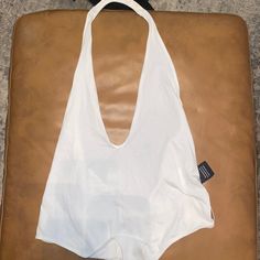 Nwt Express Bodysuit, White. Casual White Bodysuit For Night Out, White One-piece Beach Top, White Bodysuit For Summer Night Out, White Sleeveless Halter Top For Poolside, White One-piece Casual Top, Casual White Halter Top For Night Out, White Bodysuit For Summer Day Out, White Summer Bodysuit For A Day Out, White Bodysuit For Day Out