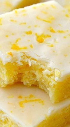 three pieces of lemon cake with white frosting