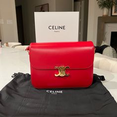 Brand New Celine Large Triomphe Bag Purchased In Tokyo, Japan. Comes With Gift Bag, Box And Receipt. Luxury Red Rectangular Shoulder Bag, High-end Red Shoulder Bag With Branded Hardware, Red Luxury Shoulder Bag With Branded Hardware, Luxury Red Shoulder Bag With Palladium Hardware, Red Bags With Gold-tone Hardware For Everyday Luxury, Luxury Red Shoulder Bag, Timeless Red Top Handle Shoulder Bag, Chic Red Bags For Everyday Luxury, Timeless Red Shoulder Bag For Evening