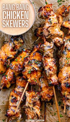 The image shows Bang Bang chicken skewers on parchment paper, along with a cup of homemade bang bang sauce. Bang Bang Chicken Skewers, Bang Bang Chicken, Bbq Recipes, Bang Bang