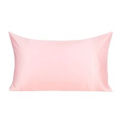 a pink pillow on a white background