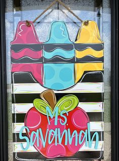 a sign that says mr and mrs savormanda hangs on the front door