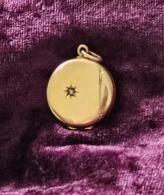 An absolutely gorgeous original Art Nouveau antique locket. Make a wish on this lone star, which is set slightly off centre in a charming way. The locket has an engraving to the side, in a style typical of the Art Nouveau period. The reverse of the locket is also beautifully detailed, so you can wear it 2 ways... So elegant. Gold filled, with the look of solid gold & in excellent condition, with no loss of colour.  It opens to hold 2 photos, closes securely & the interior looks unused & retains Art Nouveau Medallion Necklace For Gift, Art Deco Yellow Gold Locket Necklace, Bronze Victorian Locket Necklace, Ornate Brass Locket Jewelry, Art Nouveau Locket, Art Nouveau Antiques, Antique Locket, Star Chain, Lucky Star