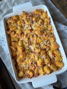 a casserole dish with meat and cheese in it