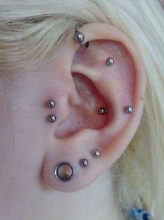 Ear with simple ball piercings Ear Piercing Set Ideas, Pretty Poison, Face Piercings, Piercing Ideas