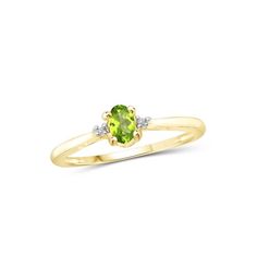 A VIBRANT ACCENT PIECE THAT GLOWS FROM WITHIN Made with real Peridot Gemstones, White Diamonds & 14K Gold Plated Silver Unlike cheaply made gemstone rings for women that turn out to be fake, with dull, flat-looking faux stones, the JewelersClub Peridot Ring features a genuine 0.25 carat Peridot stone flanked by real White Diamond clusters. Crafted with care and expert workmanship and set in a hypoallergenic, 14K Gold Plated Silver band, this gorgeous Green Oval ring is durably made with premium Peridot Jewelry Rings, Peridot Jewelry, Green Oval, Ring Birthstone, Peridot Stone, Oval Ring, Peridot Gemstone, Peridot Ring, Silver Jewelry Rings