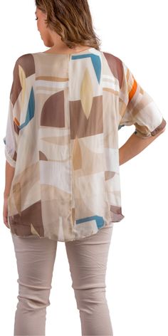 Our Classic Kaftan Style Blouse with Frayed Edge Under Layer Hem with a Graphic Shape Print. 100% Silk // Interior: 95% Viscose, 5% Elastic Fits Sizes XS- XL Made in Italy Summer Beige Silk Blouse, Beige Silk Blouse For Summer, Silk Blouse For Vacation, Beach Rayon Blouse With Relaxed Fit, Beach Rayon Blouse Relaxed Fit, Casual Silk Beach Blouse, Casual Silk Blouse For Beach, Casual Silk Blouse For The Beach, Casual Silk Blouse For Vacation