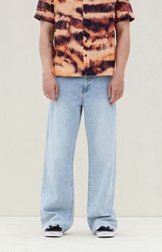 Unleash your style with the PacSun Indigo Extreme Baggy Jeans. Featuring a zipfly closure, a light indigo wash on rigid denim, and a mid-rise waist, these jeans redefine casual cool. The oversized leg adds an extra edge to your look, making these jeans a bold statement for your everyday style. Light Wash Zip Fly Jeans For Streetwear, Urban Jeans With Relaxed Fit And Zip Fly, Light Wash Zip Fly Bottoms For Streetwear, Urban Style Denim Blue Jeans For Summer, Urban Denim Blue Jeans For Summer, Faded Denim Bottoms With Zip Fly, Washed Blue Rigid Denim Jeans For Summer, Summer Washed Blue Rigid Denim Jeans, Summer Urban Relaxed Fit Jeans