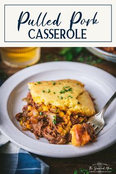 pulled pork casserole on a white plate with a fork