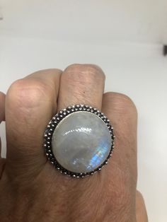 Large Vintage ring set with huge Rainbow Moonstone. Low content silver not sterling About an in long Size 8 can be resized at my jeweler for a $10-$20 fee All rings are shipped free in the US in a nice gift box. Check out our over a THOUSAND great reviews Engraving is $4 per letter and is not always perfect depending on the piece. It can take a few days if the jeweler is busy. This is payable to Paypal Judithsltd@gmail.com Round Moonstone Jewelry With Large Stone, Moonstone Jewelry With Large Round Stone, Nickel-free Spiritual Round Moonstone Ring, Nickel Free Round Spiritual Moonstone Ring, Spiritual Nickel-free Moonstone Ring, Large Moonstone Spiritual Ring, Silver Moonstone Ring With Cabochon Cut, Silver Moonstone Cabochon Ring, Adjustable Crystal Ring With Large Stone