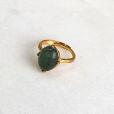 A stunning and large 13mm all natural green-blue moss aquamarine with a very high dome is prong set into a 22k gold over sterling vermeil setting. This stone absolutely glows from every single angle. The size is fully adjustable on the very comfortable band. An absolute one and only fine gemstone ring. Gold Oval Emerald Ring For Everyday Wear, Gold Emerald Ring With Natural Stones For Anniversary, Elegant Gold Emerald Ring With Natural Stones, Gold Emerald Ring With Large Oval Stone, Spiritual Gold Emerald Ring With Gemstone, Spiritual Gold Emerald Ring, Gold Emerald Ring With Spiritual Style, Handmade Gold Oval Emerald Ring, Gold Emerald Cabochon Ring Gift