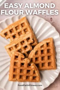 three waffles on a white plate with the words easy almond flour waffles