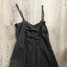 Cute Small Black Dress With Buttons And Criss-Cross Detail In The Back (Urban Outfitters) - No Tag, But Never Worn Black Beach Dress From Urban Outfitters, Black Beach Dress By Urban Outfitters, Casual Black Dresses By Urban Outfitters, Black Urban Outfitters Beach Dress, Black Cotton Mini Dress For Date Night, Summer Black Mini Dress By Urban Outfitters, Black Summer Mini Dress By Urban Outfitters, Urban Outfitters Black Mini Dress For Summer, Urban Outfitters Black Summer Mini Dress